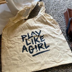 PLay like a girl canvas tote